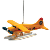 Close-up of the Flight Outfitters Seaplane Christmas Ornament, showcasing its detailed design and painted graphics.