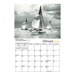 Inside layout of Art of the Boat 2025 Mystic Seaport Calendar showing monthly design