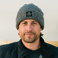 Man wearing grey Flight Outfitters Beanie Winter Hat, front view