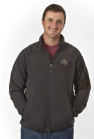 A man wearing the Flight Outfitters Fairbanks Fleece in Heather Obsidian, highlighting its comfort and fit.