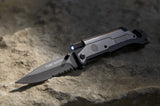 Close-up of the Flight Outfitters Pilot Survival Knife’s removable LED flashlight with a magnetic back.