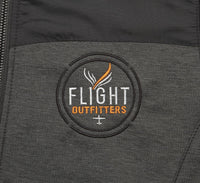 lose-up of the Flight Outfitters logo on the Men's Kodiak Jacket, emphasizing its premium branding and quality.