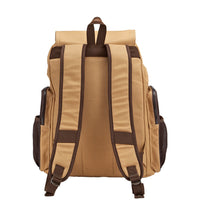 Rear view of the Flight Outfitters Bush Pilot Rucksack, highlighting the padded shoulder straps and leather-reinforced hanging loop.