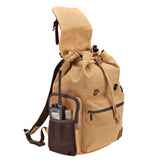 Side view of the Flight Outfitters Bush Pilot Rucksack with the side pocket open, displaying its storage capacity.